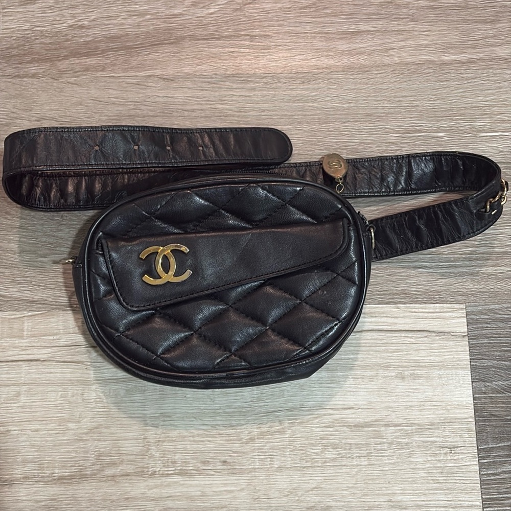 Vintage black leather CHANEL waste purse Fanny pack with chain belt.